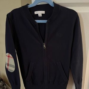 Slightly worn navy Burberry sweater size 7years but runs very small